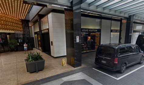 Woman arrested at Melbourne Airport over theft of Louis Vuitton 